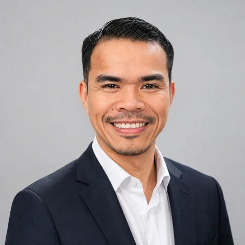 Nguyen Quang Huy, CEO of Netbase JSC and web-to-print domain consultant, in a navy suit